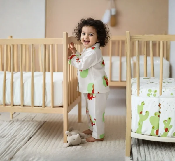 Green elephant print kids night suit side view, soft breathable cotton sleepwear