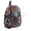 Black patchwork cotton backpack detail focus, textured fabric and stitching close-up