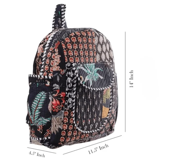 Black patchwork cotton backpack detail focus, textured fabric and stitching close-up