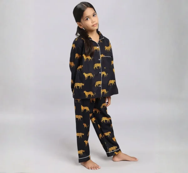 Kids black tiger print cotton night suit standing pose, comfortable and stylish nightwear