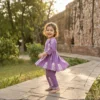 Light purple girls cotton co-ord set playful pose, fun and flexible kids outfit