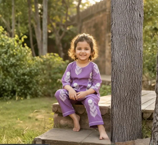 Light purple floral girls cotton co-ord set front seated view, stylish and breathable outfit