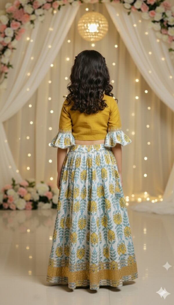 Girls lehenga choli design detail close-up, showcasing fabric texture and embroidery