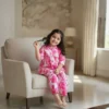 Pink floral girls cotton co-ord set front seated view, cozy and stylish everyday wear