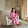 Pink floral girls cotton co-ord set centered seated pose, elegant and coordinated outfit