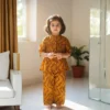 Mustard girls cotton co‑ord set profile view, comfortable and stylish summer outfit for kids