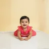Rani pink cotton infant frock candid shot, cozy and stylish baby clothing