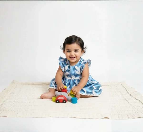 Blue cotton infant frock full length view, soft and breathable baby outfit
