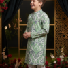 Boys kurta pajama design detail close-up, showcasing fabric texture and pattern