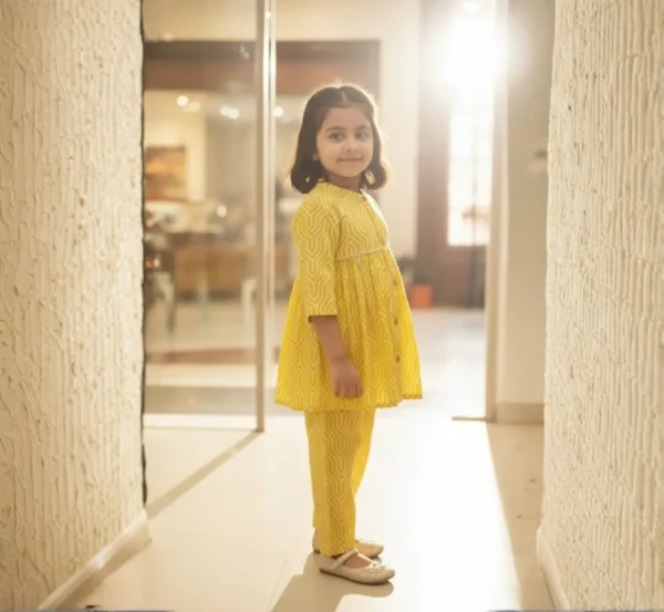 Yellow girls cotton co-ord set alternate front pose, trendy and breathable kids outfit