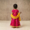 Fuschia Bandhej Lehenga Choli for girls back view with yellow dupatta