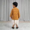 Mustard Dhoti Kurta for boys back view showing printed kurta and white dhoti
