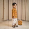 Mustard Dhoti Kurta for boys side view showing long sleeves and white dhoti