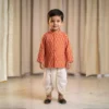 Orange Dhoti Kurta for boys front view with printed kurta and white dhoti