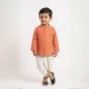 Orange Dhoti Kurta print detail showing repeating geometric motif on kurta