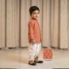 Orange Dhoti Kurta for boys standing view with long sleeves and white dhoti