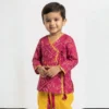 Fuchsia Bandhej Angrakha with Dhoti for boys close-up, wrap front and yellow edging